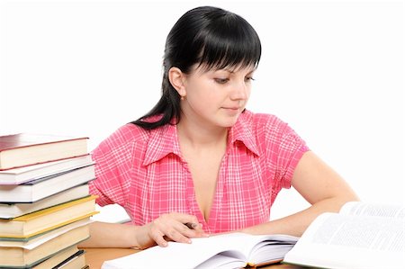 simsearch:400-04175049,k - Girl doing homework on a white background Stock Photo - Budget Royalty-Free & Subscription, Code: 400-04171926