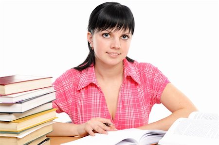 simsearch:400-04175049,k - Girl doing homework on a white background Stock Photo - Budget Royalty-Free & Subscription, Code: 400-04171927