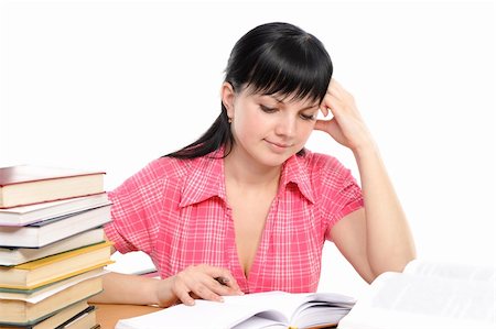 simsearch:400-04175049,k - Girl doing homework on a white background Stock Photo - Budget Royalty-Free & Subscription, Code: 400-04171928