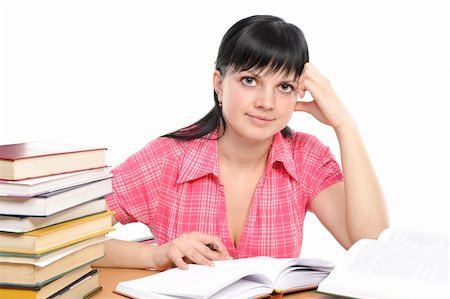 simsearch:400-04175049,k - Girl doing homework on a white background Stock Photo - Budget Royalty-Free & Subscription, Code: 400-04171929