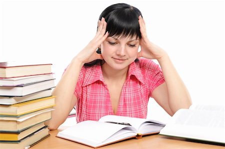 simsearch:400-04175049,k - Girl doing homework on a white background Stock Photo - Budget Royalty-Free & Subscription, Code: 400-04171930