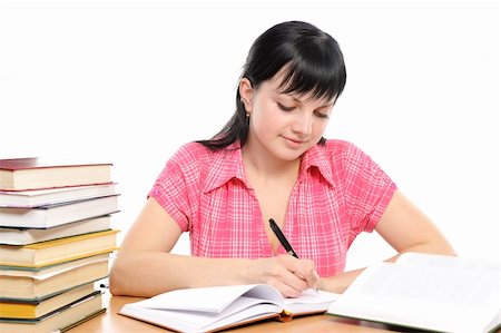 simsearch:400-04175049,k - Girl doing homework on a white background Stock Photo - Budget Royalty-Free & Subscription, Code: 400-04171932