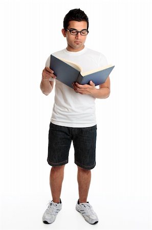 simsearch:400-04200146,k - A man reads from a hardcover book Stock Photo - Budget Royalty-Free & Subscription, Code: 400-04172169
