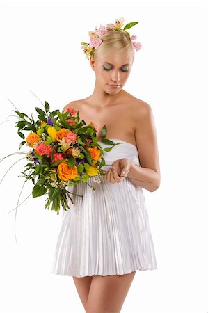 simsearch:400-05201906,k - young and beautiful woman in short white dress with flower in hair and keeping a color bouquet Stockbilder - Microstock & Abonnement, Bildnummer: 400-04172188