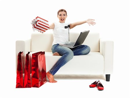 Beautiful young woman at home doing online shop, Consumerism concept Stock Photo - Budget Royalty-Free & Subscription, Code: 400-04172557