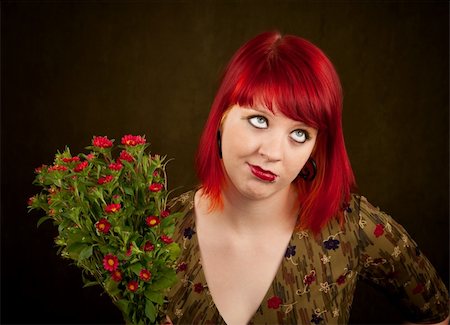 simsearch:400-06330521,k - Pretty punky girl with brightly dyed red hair and flowers Photographie de stock - Aubaine LD & Abonnement, Code: 400-04172688