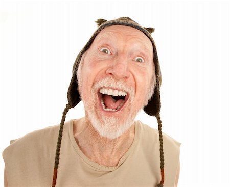 simsearch:400-04188833,k - Laughing senior man on white background in knit cap Photographie de stock - Aubaine LD & Abonnement, Code: 400-04172715