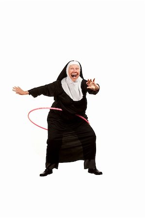 simsearch:400-04671065,k - Playful nun on white with plastic hoop Stock Photo - Budget Royalty-Free & Subscription, Code: 400-04172734