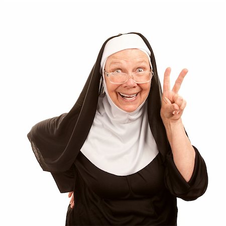 simsearch:400-04671065,k - Funny nun on white background making peace sign Stock Photo - Budget Royalty-Free & Subscription, Code: 400-04172744