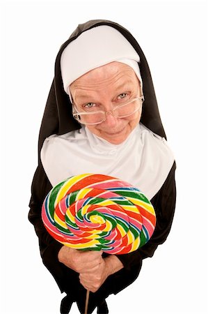 simsearch:400-04671065,k - Funny nun on white background with colorful lollipop Stock Photo - Budget Royalty-Free & Subscription, Code: 400-04172740