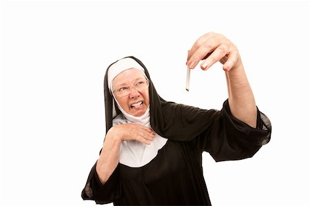 simsearch:400-04671065,k - Senior nun showing disgust holding burnt cigarette Stock Photo - Budget Royalty-Free & Subscription, Code: 400-04172742