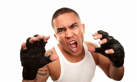 Hispanic man in t-shirt wearing mixed martial arts gloves Stock Photo - Budget Royalty-Free & Subscription, Code: 400-04172755