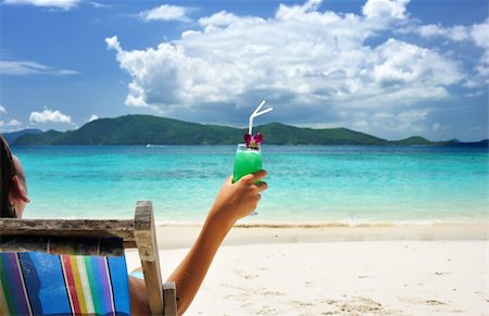 Man on a beach with cocktail Stock Photo - Budget Royalty-Free & Subscription, Code: 400-04172876