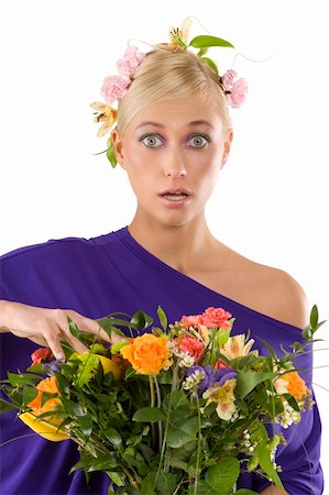 simsearch:400-05197146,k - close up of pretty young blond girl in violet dress with flower and bouquet looking in camera with a surprise expression Stock Photo - Budget Royalty-Free & Subscription, Code: 400-04172940