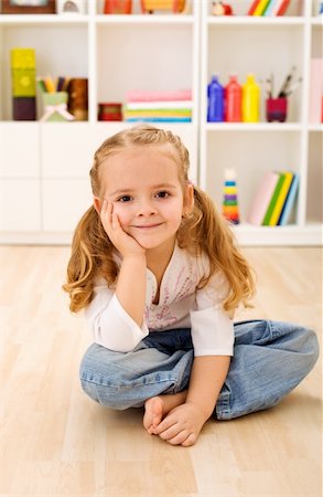 daycare on floor - Happy little girl sitting in her room at home Stock Photo - Budget Royalty-Free & Subscription, Code: 400-04172987
