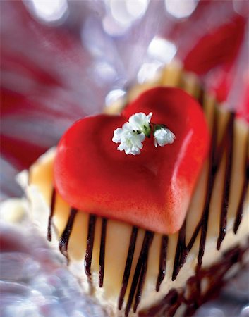 Dessert cake with heart shaped decoration (close-up, high angle view) Stock Photo - Budget Royalty-Free & Subscription, Code: 400-04173739