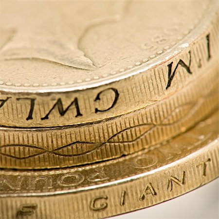 simsearch:400-07774250,k - macro shot of english one and two pound coins Stock Photo - Budget Royalty-Free & Subscription, Code: 400-04173841