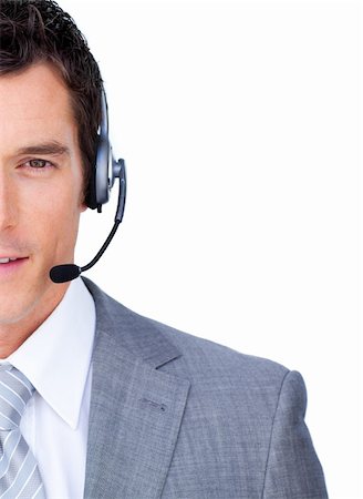 simsearch:400-04119293,k - Close-up of a businessman using headset against a white background Fotografie stock - Microstock e Abbonamento, Codice: 400-04184007