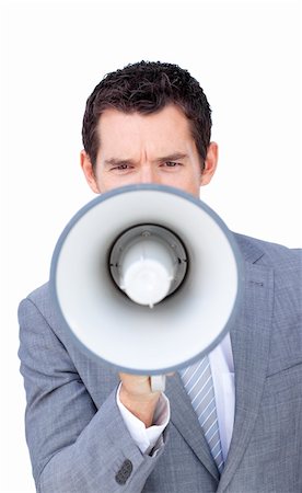 simsearch:400-04126489,k - Angry businessman shouting through a megaphone against a white background Stock Photo - Budget Royalty-Free & Subscription, Code: 400-04184008