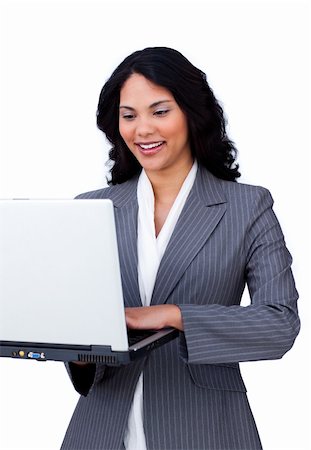 simsearch:400-04187842,k - Cheerful businesswoman using a laptop at work Stock Photo - Budget Royalty-Free & Subscription, Code: 400-04184205
