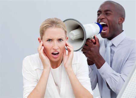 simsearch:400-04126489,k - Furious businessman shouting through a megaphone  in the office Stock Photo - Budget Royalty-Free & Subscription, Code: 400-04184244