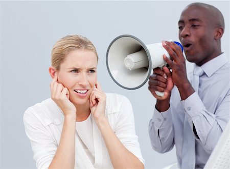 simsearch:400-04126489,k - Ambitious businessman shouting through a megaphone  in the office Stock Photo - Budget Royalty-Free & Subscription, Code: 400-04184242