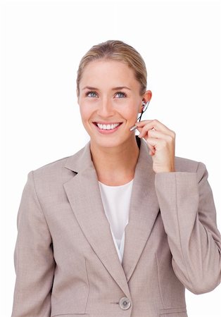 simsearch:400-03912315,k - Charismatic blond businesswoman using headset isolated on a white background Photographie de stock - Aubaine LD & Abonnement, Code: 400-04184317