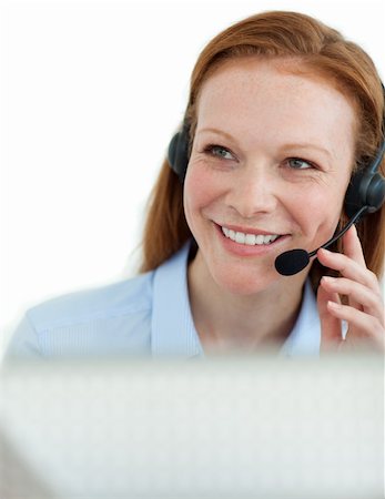 simsearch:400-03912315,k - Young customer service agent with headset on in a call center Photographie de stock - Aubaine LD & Abonnement, Code: 400-04184356