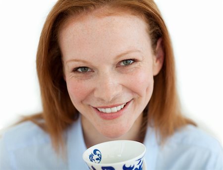 simsearch:400-04188263,k - Close-up of a businesswoman drinking a cup of tea in the office Foto de stock - Super Valor sin royalties y Suscripción, Código: 400-04184353