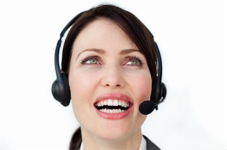 simsearch:400-04119293,k - Radiant businesswoman using headset isolated on a white background Fotografie stock - Microstock e Abbonamento, Codice: 400-04184470