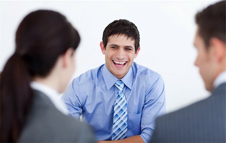 Smiling business people discussing at a job interview in the office Stock Photo - Budget Royalty-Free & Subscription, Code: 400-04184804