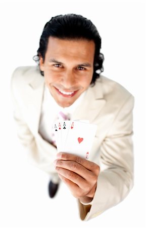 Successful businessman holding all the aces isolated on a white background Stock Photo - Budget Royalty-Free & Subscription, Code: 400-04184867