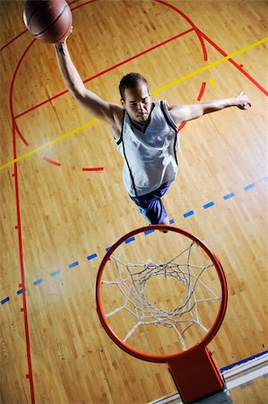 simsearch:400-04217948,k - young healthy man play basketball game indoor in gym Stock Photo - Budget Royalty-Free & Subscription, Code: 400-04185317