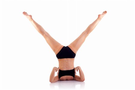 simsearch:400-07620944,k - picture of a sexy woman doing yoga ecercises over white Fotografie stock - Microstock e Abbonamento, Codice: 400-04185544