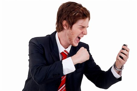 simsearch:400-09030070,k - Angry businessman yelling on the phone over white Stock Photo - Budget Royalty-Free & Subscription, Code: 400-04185600