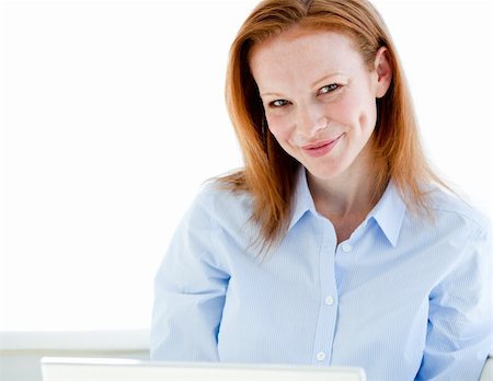 simsearch:400-04187842,k - Nice business woman working on a laptop computer in the office Stock Photo - Budget Royalty-Free & Subscription, Code: 400-04185732