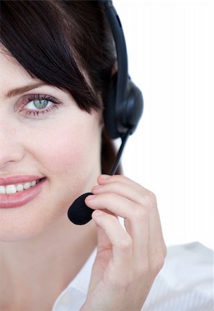 simsearch:400-04188205,k - Close-up of sales representative woman with an headset against white background Stock Photo - Budget Royalty-Free & Subscription, Code: 400-04185756