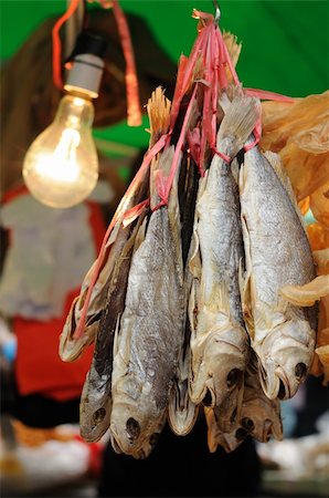 fish market in china - Dried salted fish hanging in the market Stock Photo - Budget Royalty-Free & Subscription, Code: 400-04186371