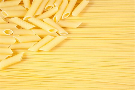 simsearch:400-04812854,k - Background. Macaroni on long spaghetti. Close up . Photographie de stock - Aubaine LD & Abonnement, Code: 400-04186882