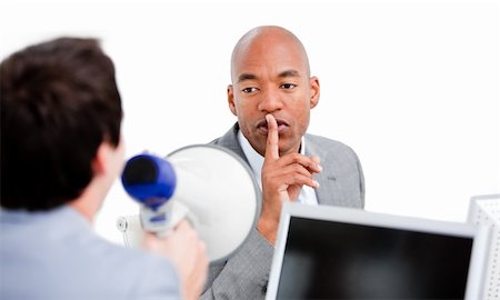 simsearch:400-06763387,k - Confident businessman asking for silece while his colleague yelling through a megaphone in the office Stock Photo - Budget Royalty-Free & Subscription, Code: 400-04186960