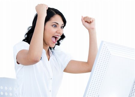 simsearch:400-04187842,k - Enthousiastic businesswoman punching the air in front of her computer in the office Stock Photo - Budget Royalty-Free & Subscription, Code: 400-04187012