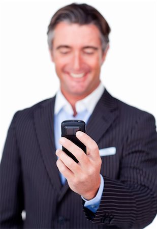 simsearch:400-04180586,k - Portrait of a businessman sending a message isolated on a white background Stockbilder - Microstock & Abonnement, Bildnummer: 400-04187154