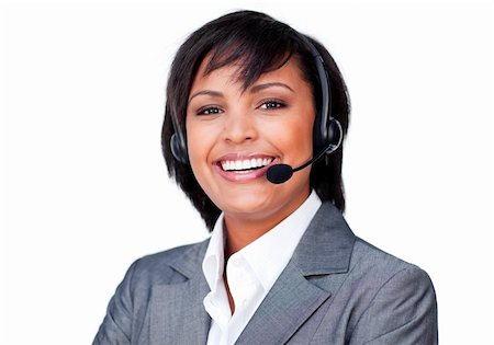 simsearch:400-04801703,k - Portrait of a smiling hispanic businesswoman with headset on against a white background Foto de stock - Super Valor sin royalties y Suscripción, Código: 400-04187284