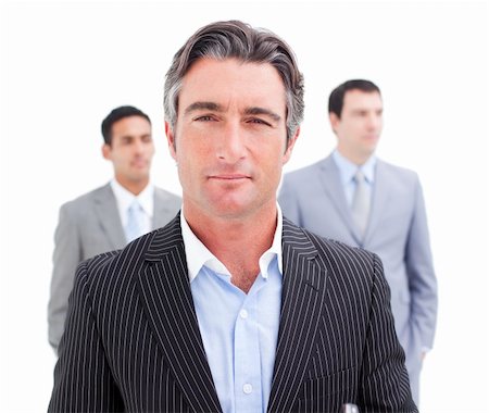 simsearch:400-04187328,k - Charming businessman posing in front of his team against a white background Foto de stock - Royalty-Free Super Valor e Assinatura, Número: 400-04187318