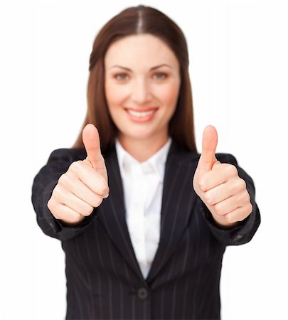 simsearch:400-04775272,k - Young businesswoman with thumbs up against a white background Photographie de stock - Aubaine LD & Abonnement, Code: 400-04187486