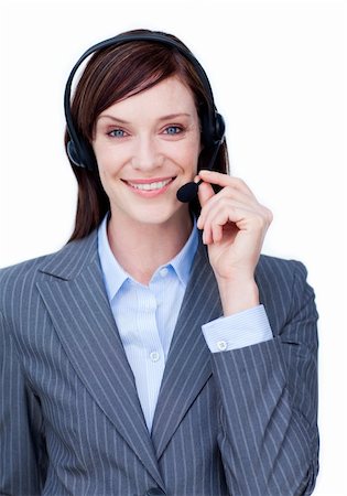 simsearch:400-03912315,k - Portrait of a smiling businesswoman with headset on against white background Photographie de stock - Aubaine LD & Abonnement, Code: 400-04187523