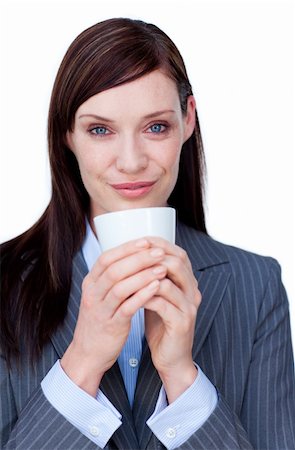 simsearch:400-04188263,k - Portrait of an attractive businesswoman drinking a coffee isolated on a white background Foto de stock - Super Valor sin royalties y Suscripción, Código: 400-04187535