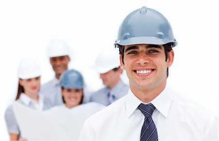 Focus on an architect wearing a hardhat against a white background Stock Photo - Budget Royalty-Free & Subscription, Code: 400-04187678