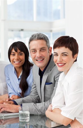 simsearch:400-05009097,k - A diverse business team sitting in a row in the office Stock Photo - Budget Royalty-Free & Subscription, Code: 400-04187724