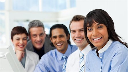 simsearch:400-05009097,k - A business group showing diversity smiling at the camera in the office Stock Photo - Budget Royalty-Free & Subscription, Code: 400-04187725